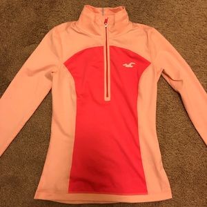 Pink athletic sweater